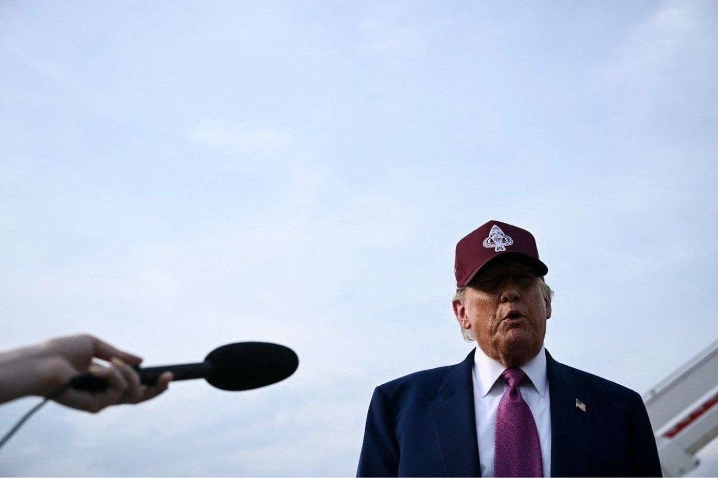Trump threatens Iran with 'hell' but reveals fresh talks